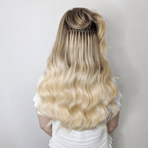 Long blond hair extensions