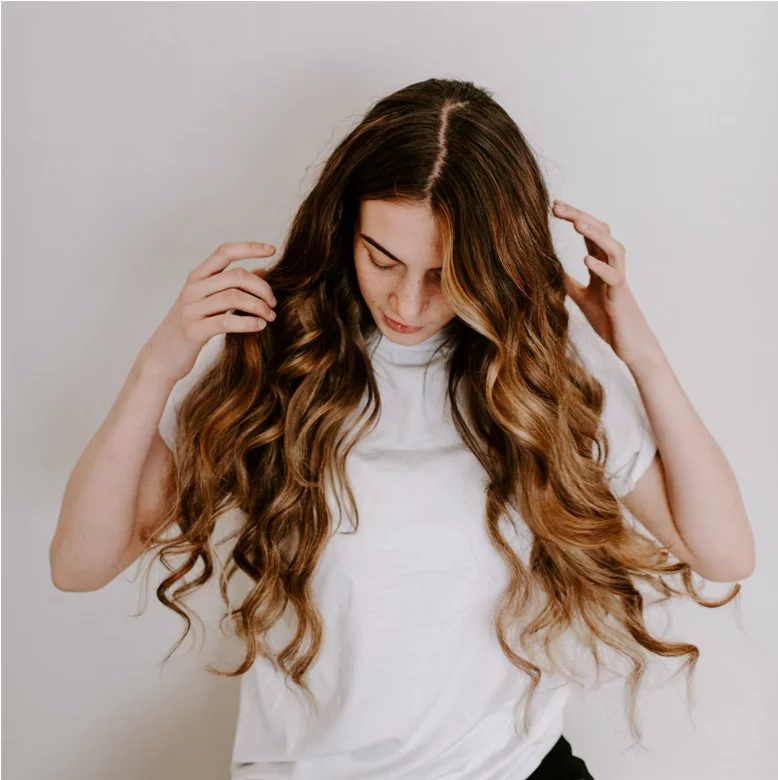 Girl with long wavy hair extensions